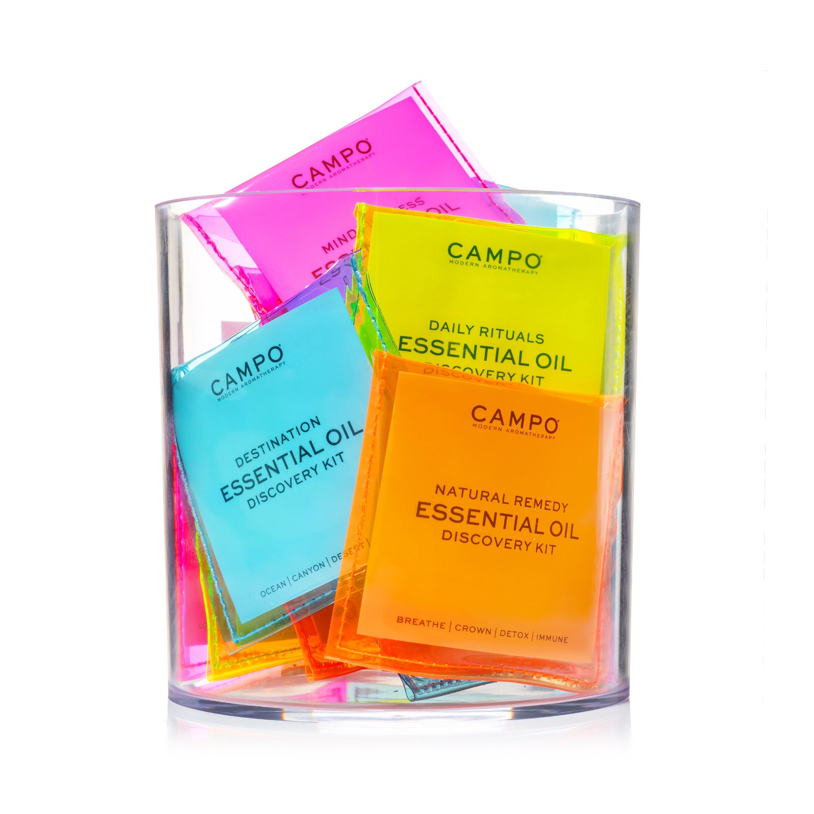Campo Pure Essential Oil Mindfulness  Kit with vials of Love, Gratitude, Manifest and Sanctuary  Essential Oils in neon pink  pouch by Campo.
