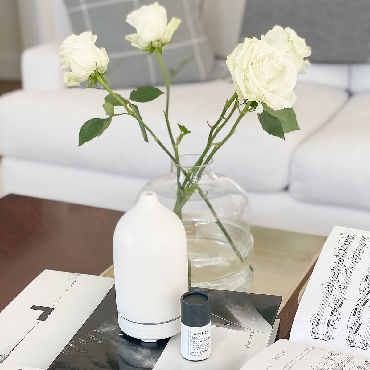 Campo RELAX Pure Essential Oil Blend and white essential oil diffuser.